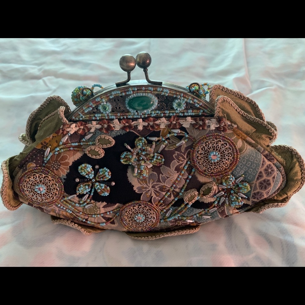 Mary Frances turquoise purse. Medium use